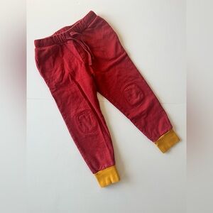 Little Green Radicals Red and Yellow Joggers with Knee Patch. Neutral Gender